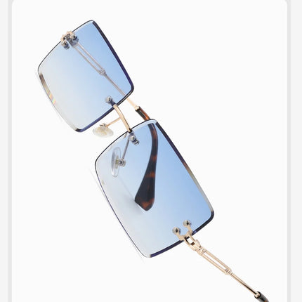 Hot-selling square rimless sunglasses, ultra-light, comfortable, multi-color lenses, stylish and practical.