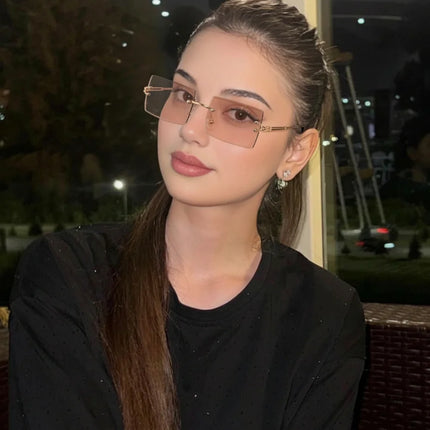 Hot-selling square rimless sunglasses, ultra-light, comfortable, multi-color lenses, stylish and practical.